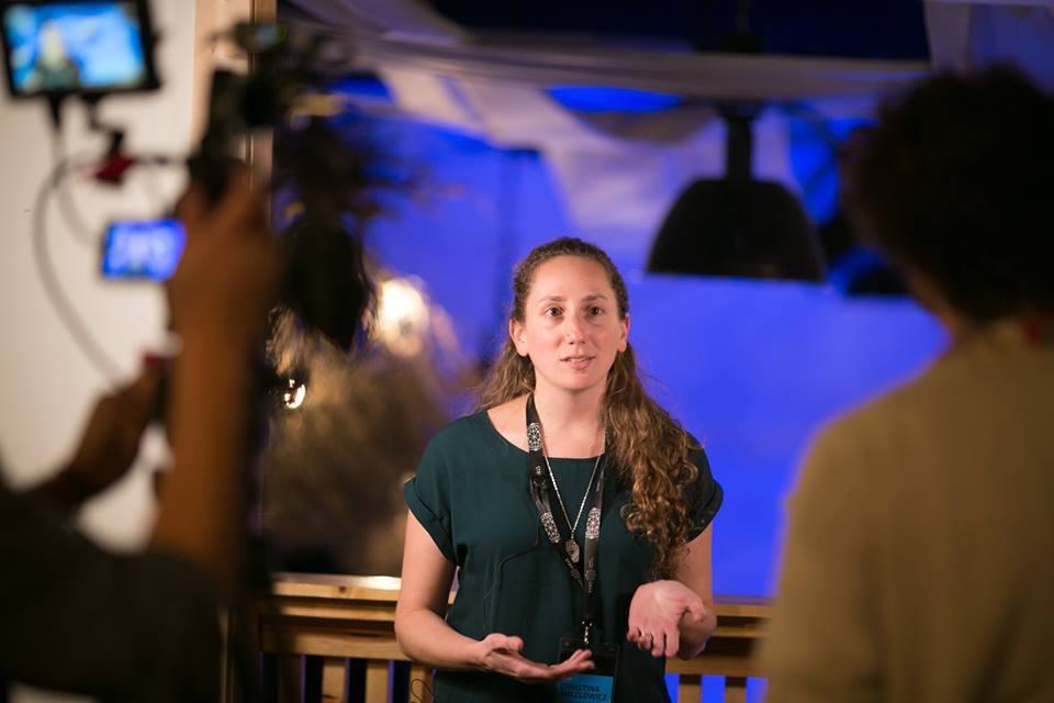 A photo of Christina speaking at City Crawl.